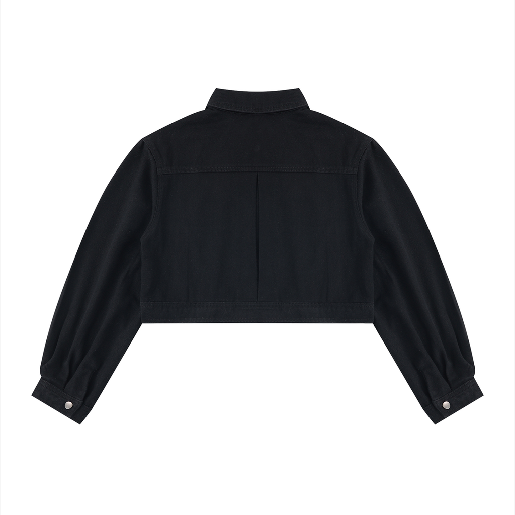 Black cropped denim jacket, back view with plain denim and cropped hem.