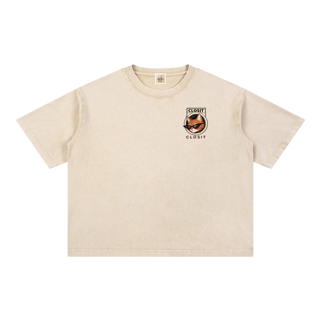 Light Apricot oversized T-shirt, front view with small cat graphic on the chest.