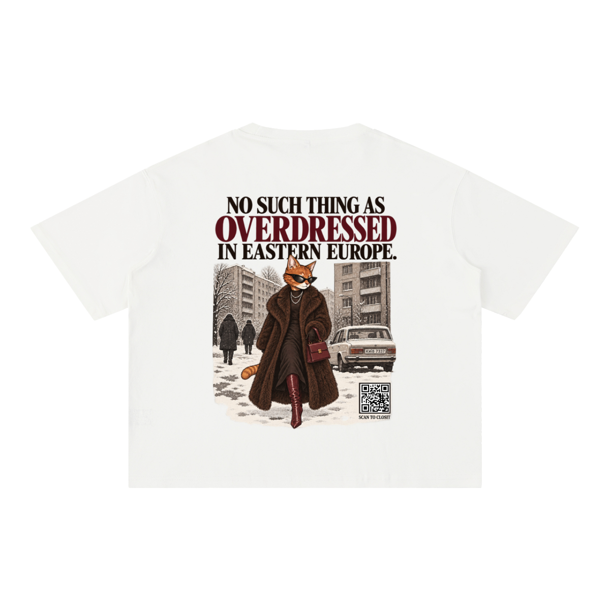 White oversized T-shirt, back view with No Such Thing as Overdressed in Eastern Europe slogan and cat in a winter street.