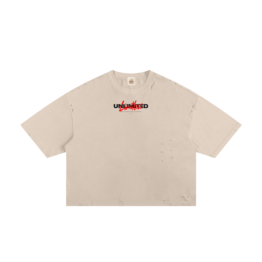 Apricot frayed boxy T-shirt, front view with small Unlimited lettering with red script.